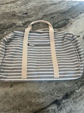 Known Supply  Gray and Cream Canvas Bag measures approximately 10x18 inche